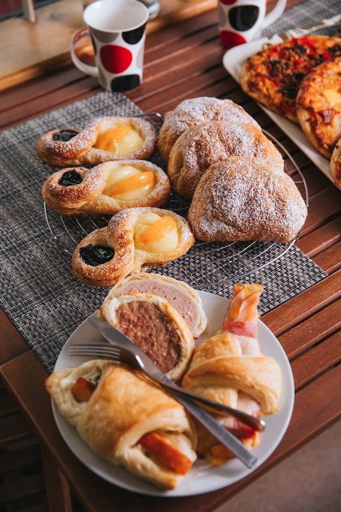Fresh danishes, sugared buns and sausage rolls from the ovens